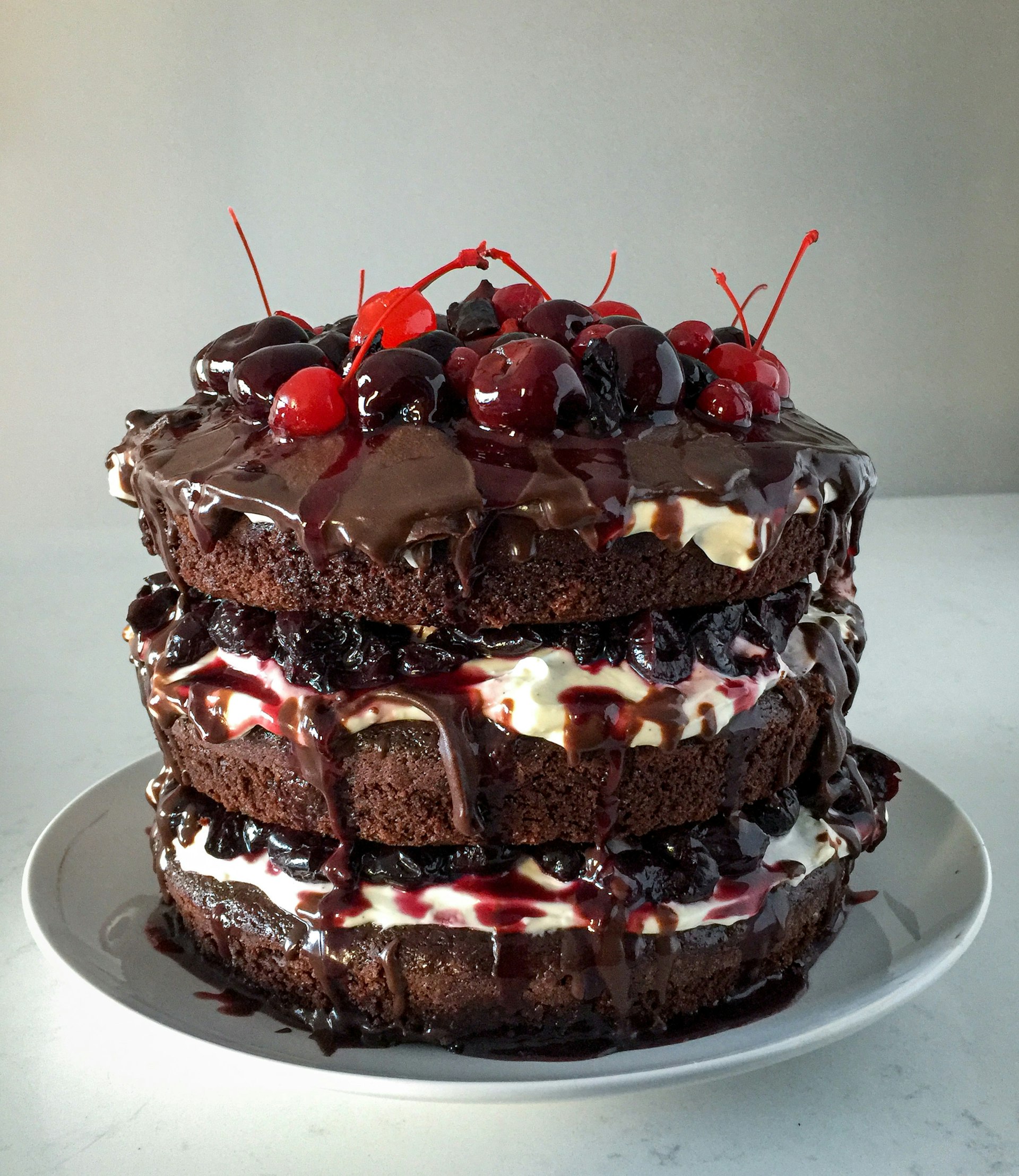 A colourful celebration cake with hand-piped detail