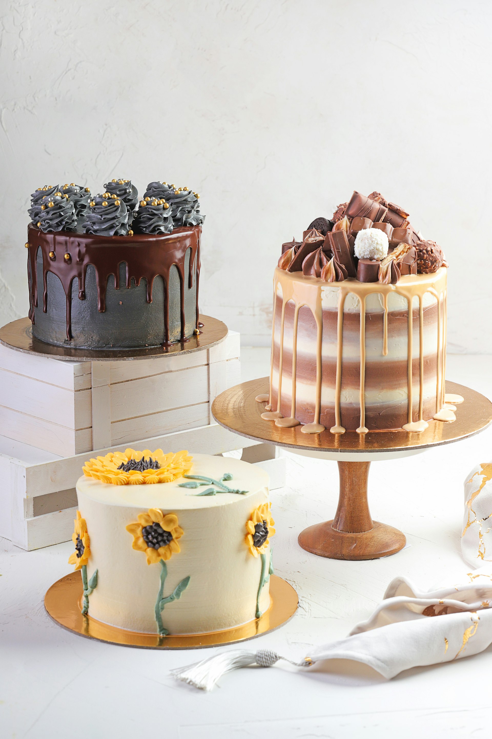 A white wedding cake decorated with delicate sugar flowers